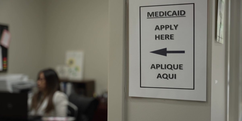 img of The Paper Wall: How Medicaid Work Requirements Are Constructing a Barrier to Care, Not Work