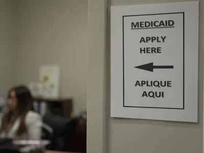 img of The Paper Wall: How Medicaid Work Requirements Are Constructing a Barrier to Care, Not Work