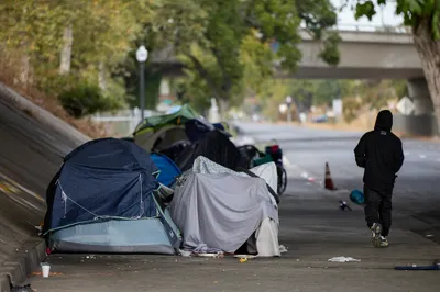 img of The Homelessness Theater: Gavin Newsom's Two-Decade Dance of Deflection and Failed Promises