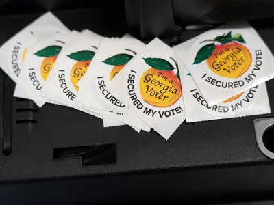img of The Georgia Runoff: A Test of Democracy's Resilience in Marjorie Taylor Greene's District