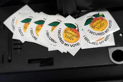 img of The Georgia Runoff: A Test of Democracy's Resilience in Marjorie Taylor Greene's District