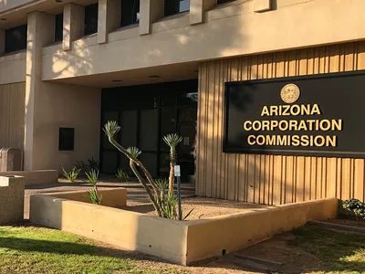 img of Cheering Before the Evidence: How Arizona's Utility Regulators Are Betraying Public Trust