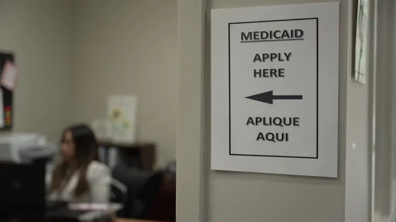 img of The Paper Wall: How Medicaid Work Requirements Are Constructing a Barrier to Care, Not Work