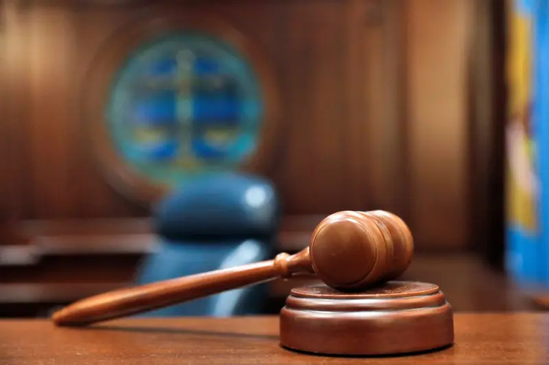 img of Theater of the Absurd: How a Legal Loophole is Dismissing Democracy's Defenders